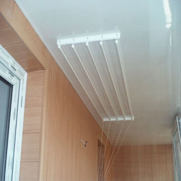 Установка потолочной сушилки для белья на балконе | онлайн-журнал о ремонте и дизайне