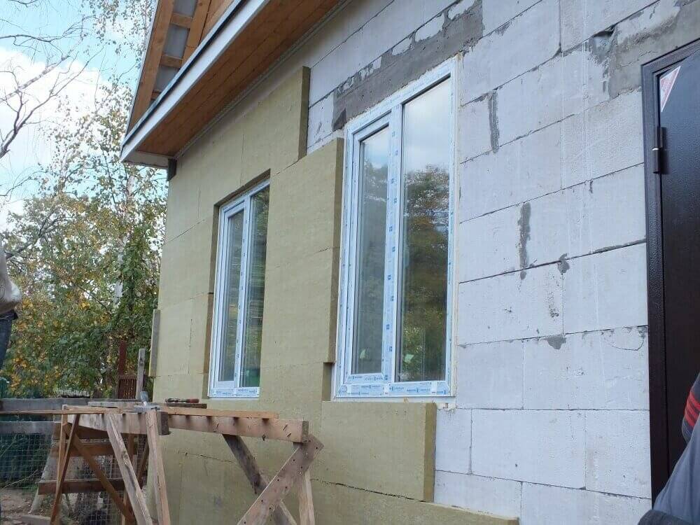 Чем утеплить дом из пеноблоков снаружи: технология, материалы